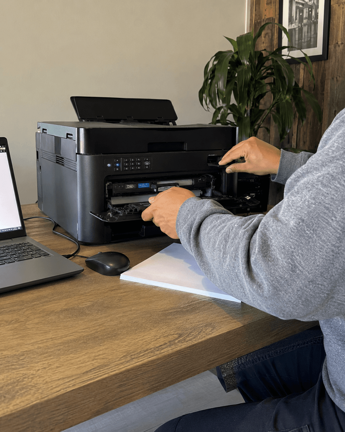 Office printer being inspected for a service issue